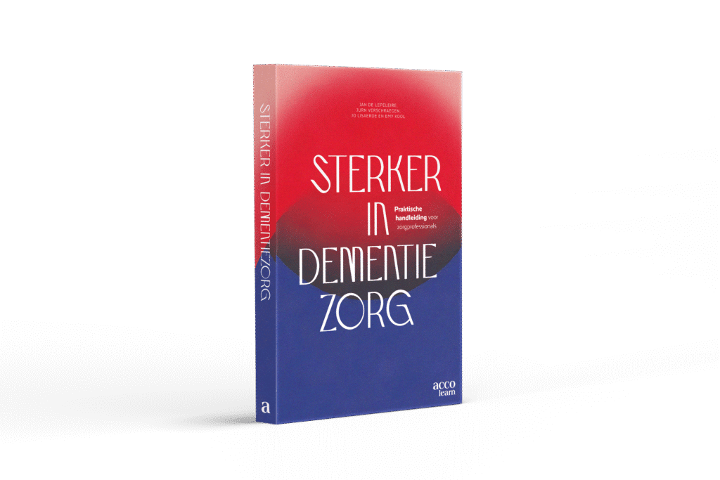 Een boek met de titel *Sterker in Dementiezorg* staat rechtop tegen een witte achtergrond. De omslag heeft een rood-naar-blauw kleurverloop en witte tekst, met een klein logo en tekst in de rechteronderhoek.